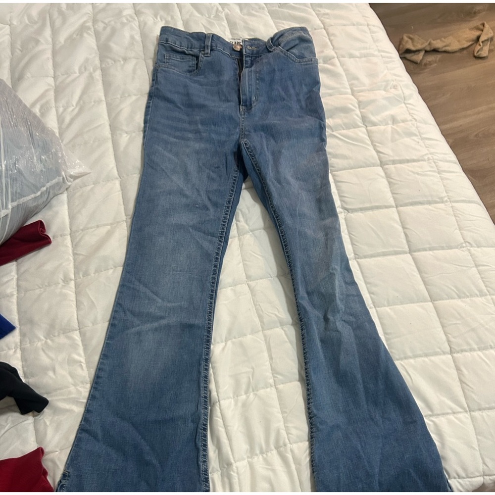 Bootcut jeans has an opening in the bottom of the jeans